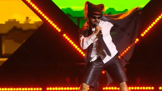 Akylas Eurovision 2026 εμφάνιση στον ημιτελικό Σαν Μαρίνο με πορτοκαλί μπότες